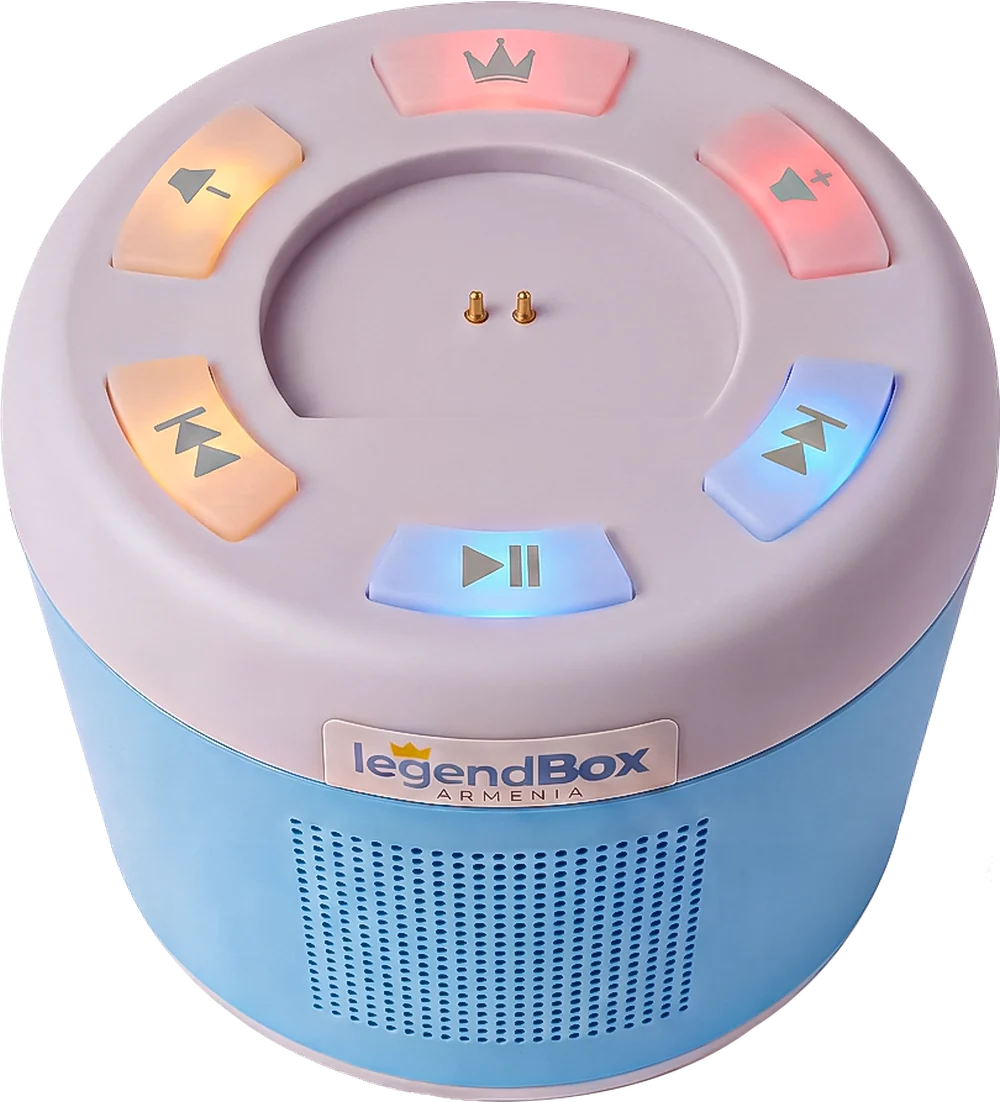The LegendBox seen from above, its six buttons lit in different colours around the two-pin magnetic port, speaker grille below